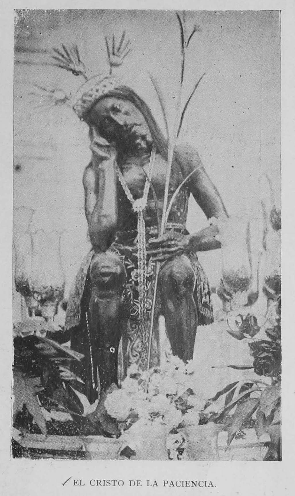 A black and white photograph of a sculpture of Jesus.