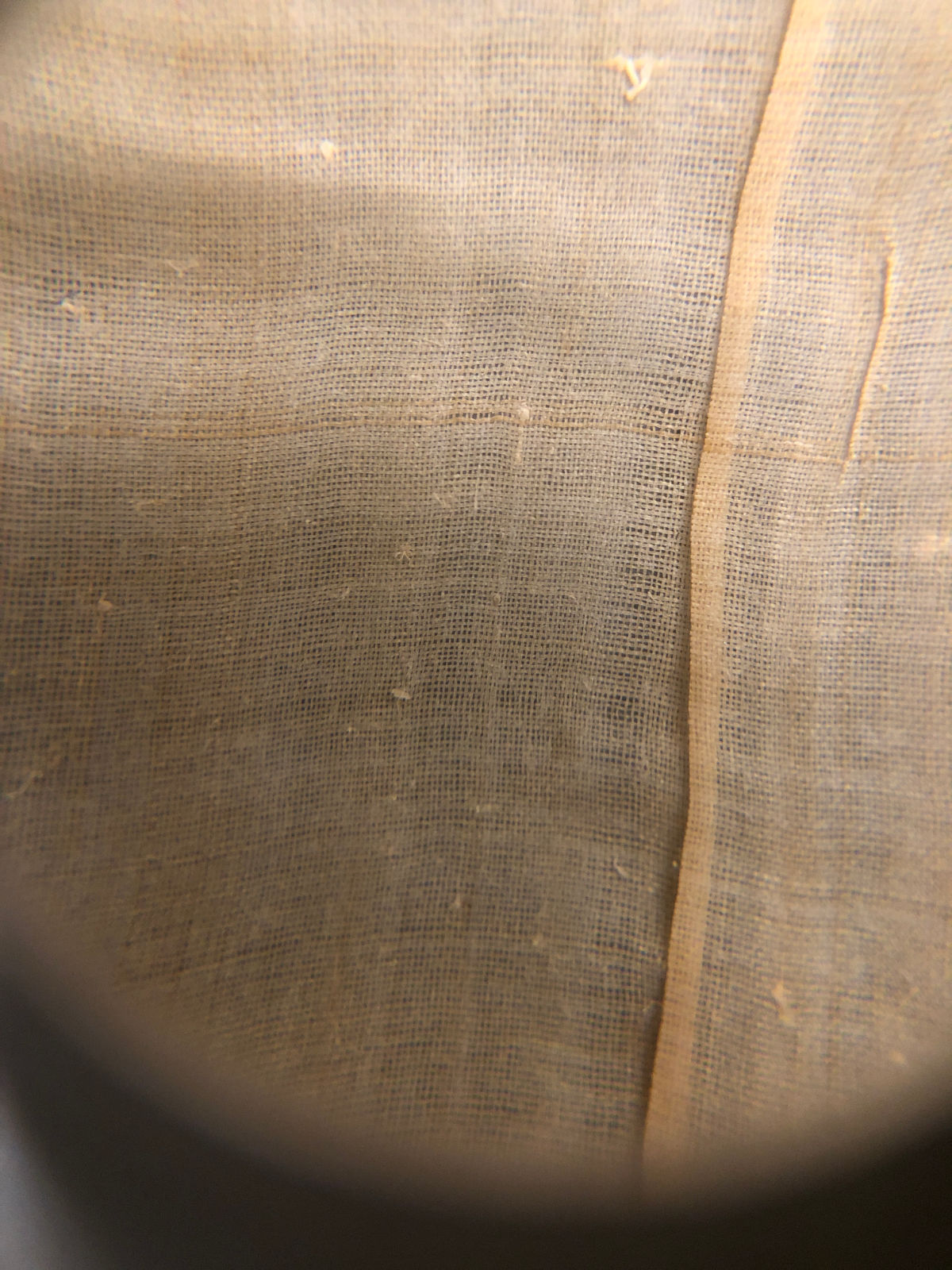 A photo of the detail of a fabric weave.